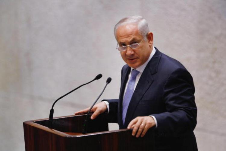 Israeli Prime Minister-Designate Benjamin Netanyahu said he was willing to talk peace with the Palestinians as he presented his cabinet for parliamentary approval amid international concern Israel's new government could bury the negotiations. (David Silverman/AFP/Getty Images) Israeli Prime Minister-Designate Benjamin Netanyahu said he was willing to talk peace with the Palestinians as he presented his cabinet for parliamentary approval amid international concern Israel's new government could bury the negotiations. (David Silverman/AFP/Getty Images)