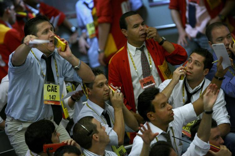 Stock traders in the iBovespa future index pit at the Mercantile and Futures Exchange (BM&F), in Sao Paulo, Brazil. (Mauricio Lima/AFP/Getty Images) Stock traders in the iBovespa future index pit at the Mercantile and Futures Exchange (BM&F), in Sao Paulo, Brazil. (Mauricio Lima/AFP/Getty Images)