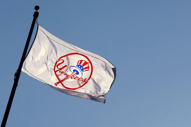 A Yankee flag waves over new New York Yankees stadium. (Chris McGrath/Getty Images) A Yankee flag waves over new New York Yankees stadium. (Chris McGrath/Getty Images)
