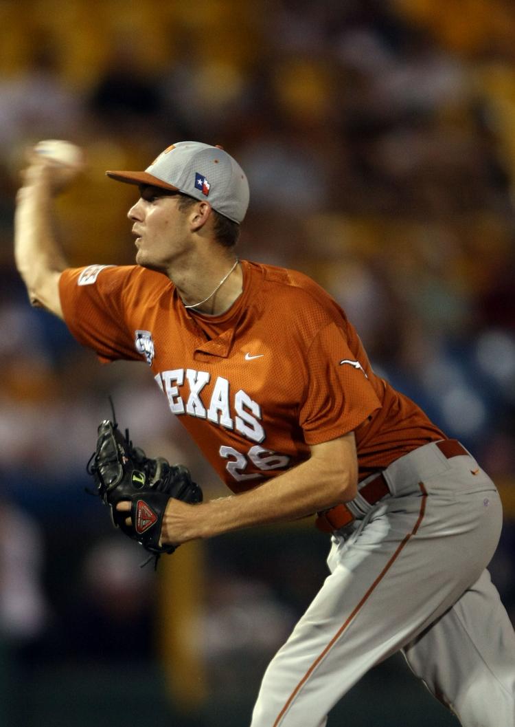 COMPLETE GAME: Texas Longhorns pitcher Taylor Jungmann fires one in Game 2 of the NCAA College World Series in Omaha. (Elsa/Getty Images) COMPLETE GAME: Texas Longhorns pitcher Taylor Jungmann fires one in Game 2 of the NCAA College World Series in Omaha. (Elsa/Getty Images)