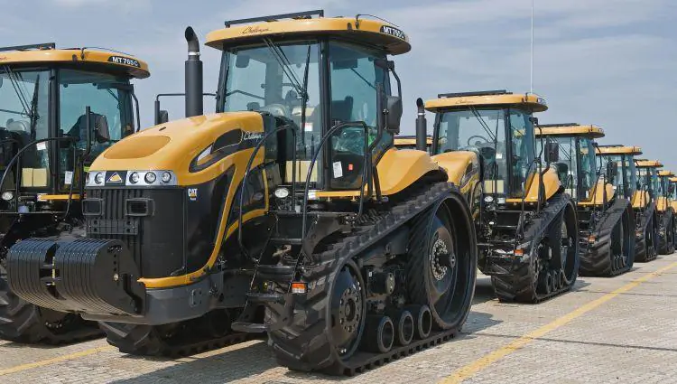 FOR EXPORT: Rows of the Caterpillar Challenger MT765C farm tractors, ideally suited to row-crop work, sit on on the docks of the Port of Baltimore's Dundalk Terminal on Aug. 27, 2009, waiting to be loaded for export by ship, in Baltimore, Md. (Paul J. Richards/AFP/Getty Images)