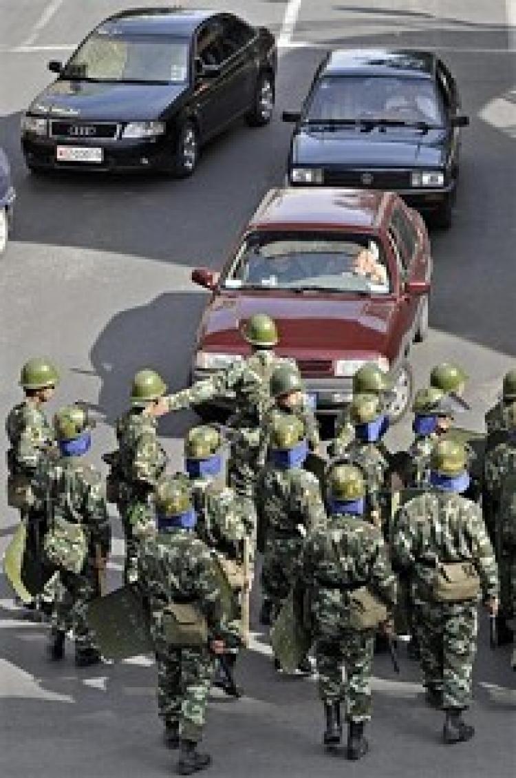 Chinese troops divert traffic in Urumqi on September 5, 2009 to control protests from Han residents in Urumqi. (PHILIPPE LOPEZ/AFP/Getty Images) Chinese troops divert traffic in Urumqi on September 5, 2009 to control protests from Han residents in Urumqi. (PHILIPPE LOPEZ/AFP/Getty Images)