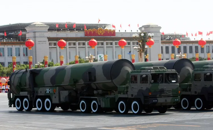 Missiles that can carry nuclear and conventional warheads on parade in Beijing on Oct. 1, 2009. (Feng Li/Getty Images)