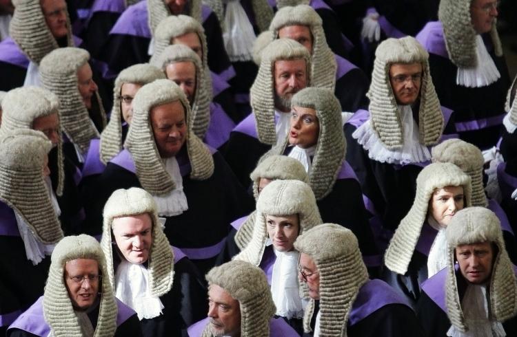 Judges arrive for their annual Service Of Thanksgiving at Westminster Abbey on October 1, 2009. The ceremony has roots in the Middle Ages when the High Court was held in Westminster Hall and judges prayed for guidance at the start of the legal year. (Dan Kitwood/Getty Images)