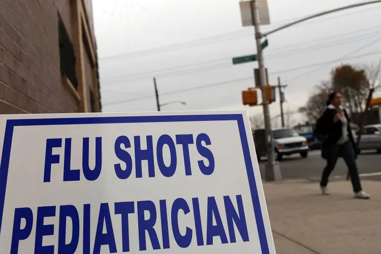 A medical center advertises for flu shots in New York City.  (Spencer Platt/Getty Images)