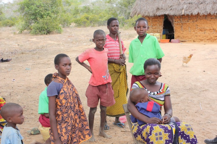 Henzanani Merakini (seated), 26, in Dakatcha Woodlands, Malindi District, Kenya, lives about 100 yards from a pilot plantation, and she feels under the constant threat of eviction from the land where her relatives lay buried. (Courtesy of ActionAid) Henzanani Merakini (seated), 26, in Dakatcha Woodlands, Malindi District, Kenya, lives about 100 yards from a pilot plantation, and she feels under the constant threat of eviction from the land where her relatives lay buried. (Courtesy of ActionAid)