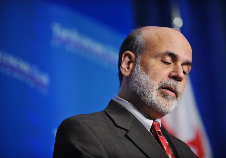 Federal Reserve Chairman Ben Bernanke looks down as he addresses the Economic Club of Washington Dec. 7, 2009 at a hotel in Washington, DC.  (Mandel Ngan/AFP/Getty Images)