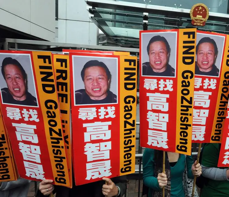 Members of a lawyers concern group protest for the release of Beijing human rights rights lawyer Gao Zhisheng outside the China Liaison office in Hong Kong on Feb. 4, 2010. (Mike Clarke/AFP/Getty Images)