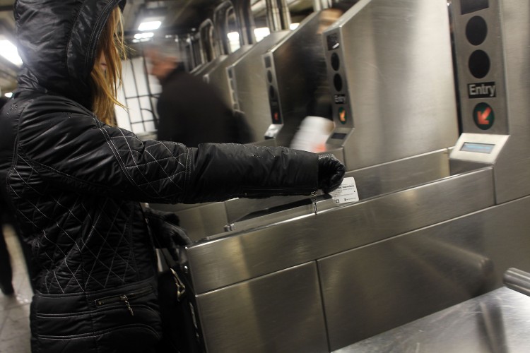 People swipe their metro cards in the New York City subway on February 23, 2010 in New York City. (Spencer Platt/Getty Images) People swipe their metro cards in the New York City subway on February 23, 2010 in New York City. (Spencer Platt/Getty Images)