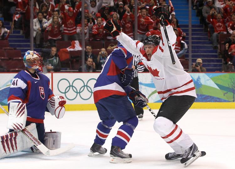 Brenden Morrow of Canada celebrates after scoring Canada's second goal of the game against Slovakia Friday night. The Canadians held on to win 3-2, forcing a gold-medal match against the U.S. on Sunday. (Bruce Bennett/Getty Images)