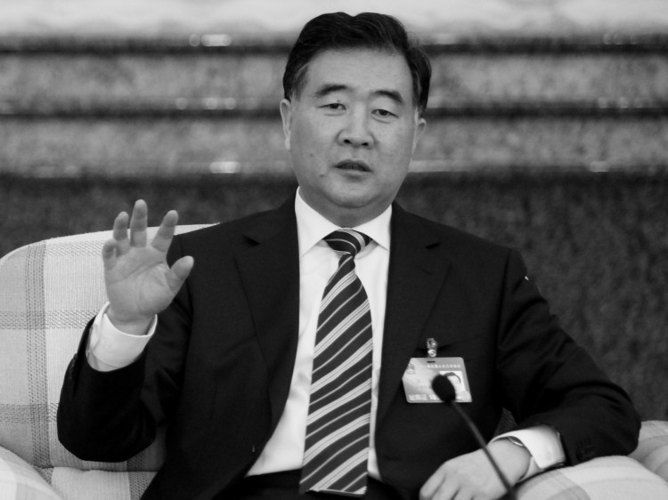 97533120 Wang Yang an apparent reformer going up against hard-liners at a political meeting
