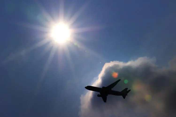 A passenger plane n shortly after takeoff at the Geneva international airport on March 11, 2010. The International Air Transport Association (IATA) said that global airlines are in line to earn a record-setting $15.1 billion in 2010. (Fabrice Coffrini/Getty Images)