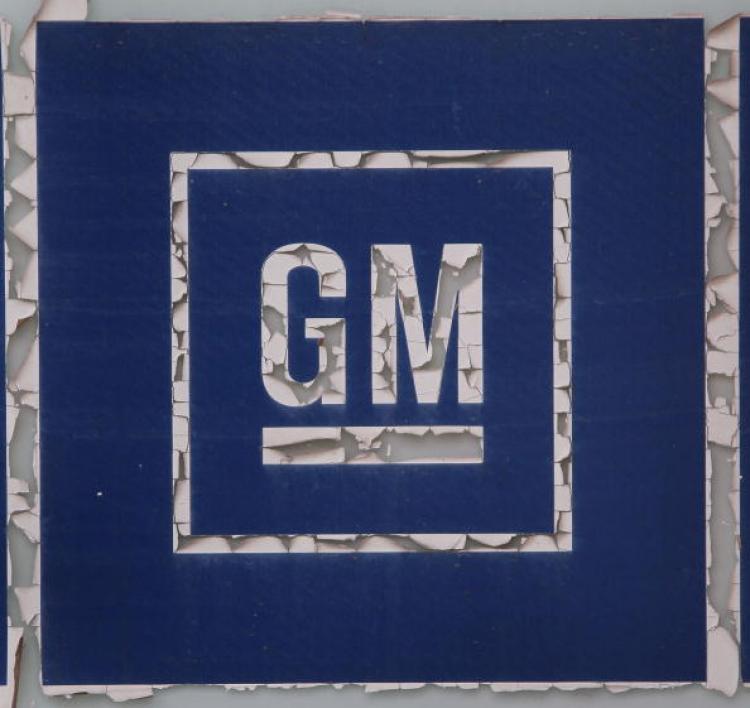 General Motors Co. (GM), since last summer's bankruptcy, has slowly crawled back from oblivion and is set to sell shares. (Scott Olson/Getty Images )