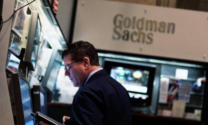 A financial professional works in the Goldman Sachs booth on the floor of the New York Stock Exchange April 16, 2010 in New York City. (Chris Hondros/Getty Images)