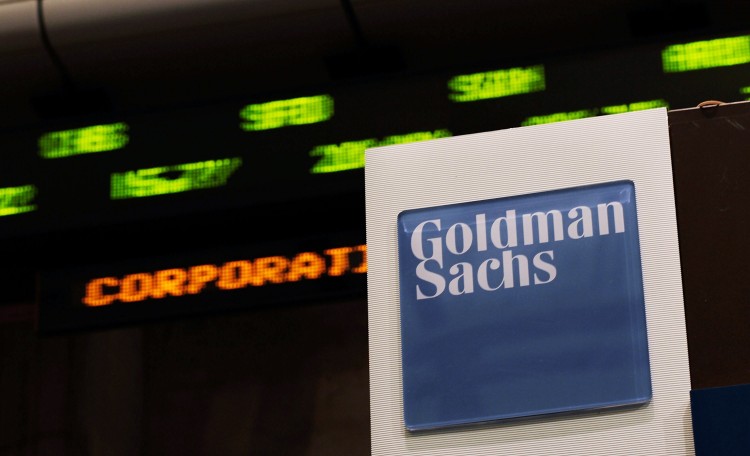 Two of the nation's biggest banking firms, Goldman Sachs Group Inc. and Bank of America Corp., reported their second quarter earnings on Tuesday. Goldman reported a profit of more than $1 billion, and Bank of America taking a steep loss. (Chris Hondros/Getty Images)