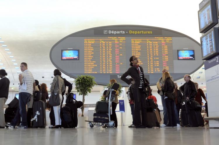 Passengers queue before boarding Air France flights on April 20 at the Charles de Gaulle airport in Paris. (Fred Dufor/AFP/Getty Images) Passengers queue before boarding Air France flights on April 20 at the Charles de Gaulle airport in Paris. (Fred Dufor/AFP/Getty Images)
