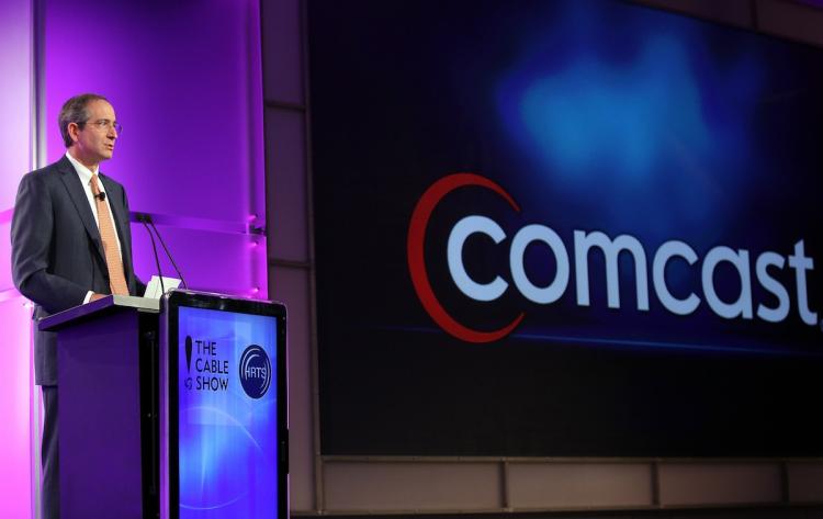 Comcast Chairman and CEO Brian Roberts Speaking at the Los Angeles Convention Center on May 11, in Los Angeles, California. Two men were sentenced to 18 months in prison on Sept. 24, after conspiring to hack Comcast.  (Angela Weiss/Getty Images )