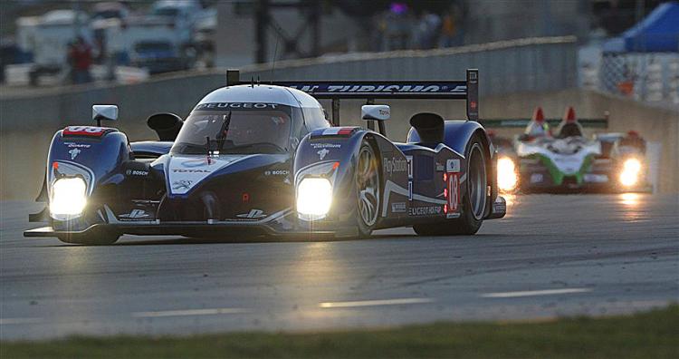 Pedro Lamy, Franck Montagny, and Stéphane Sarrazin in the #08 Peugeot won the 2010 Petit Le Mans. (Courtesy American Le Mans Series) Pedro Lamy, Franck Montagny, and Stéphane Sarrazin in the #08 Peugeot won the 2010 Petit Le Mans. (Courtesy American Le Mans Series)