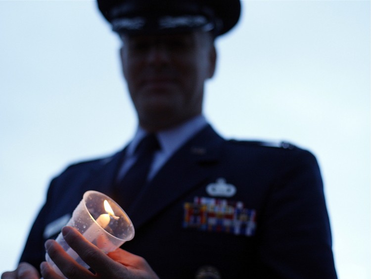 Candles were lit in the wind and rain at a national commemoration ceremony to mark the anniversary of the Sept. 11 attacks at Commonwealth Place on Sunday in Canberra, Australia. (Stefan Postles/Getty Images) Candles were lit in the wind and rain at a national commemoration ceremony to mark the anniversary of the Sept. 11 attacks at Commonwealth Place on Sunday in Canberra, Australia. (Stefan Postles/Getty Images)