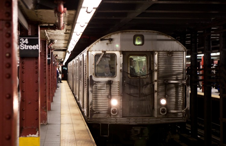 A C train pulls into Penn Station; A, C, E train schedules are affected by overnight subway work this week. (Amal Chen/The Epoch Times)
