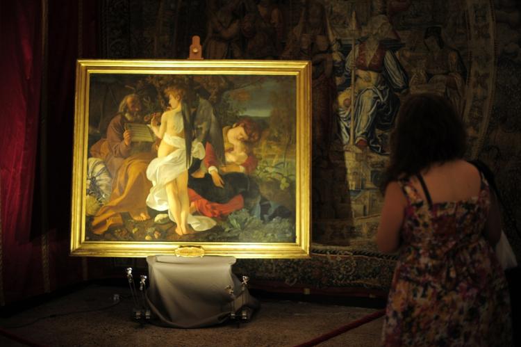 LIGHT AND DARK: Caravaggio was famous for his chiaroscuro-style paintings, which played on the contrasts between light and dark. (Olivier Morin/AFP/Getty Images) LIGHT AND DARK: Caravaggio was famous for his chiaroscuro-style paintings, which played on the contrasts between light and dark. (Olivier Morin/AFP/Getty Images)