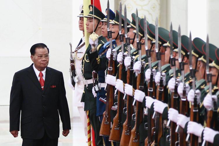 STRONG BACKING: Burmese military junta leader Gen. Than Shwe reviews a Chinese honor guard during a welcoming ceremony in Beijing, China, last September. Than Shwe retired as head of the Burmese military earlier this month, but many believe he still maintains a grip on power inside the isolated country. (Feng Li/Getty Images) STRONG BACKING: Burmese military junta leader Gen. Than Shwe reviews a Chinese honor guard during a welcoming ceremony in Beijing, China, last September. Than Shwe retired as head of the Burmese military earlier this month, but many believe he still maintains a grip on power inside the isolated country. (Feng Li/Getty Images)