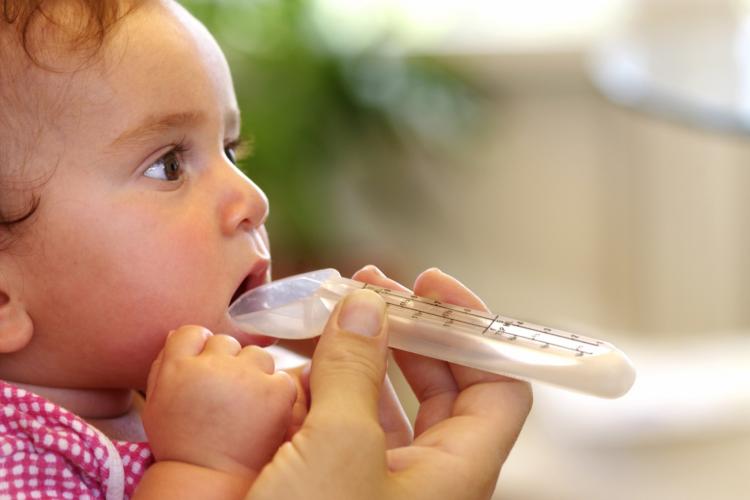 BABY DRUGGING: Pharma has set its sights on the pediatric population. (Photos.com)