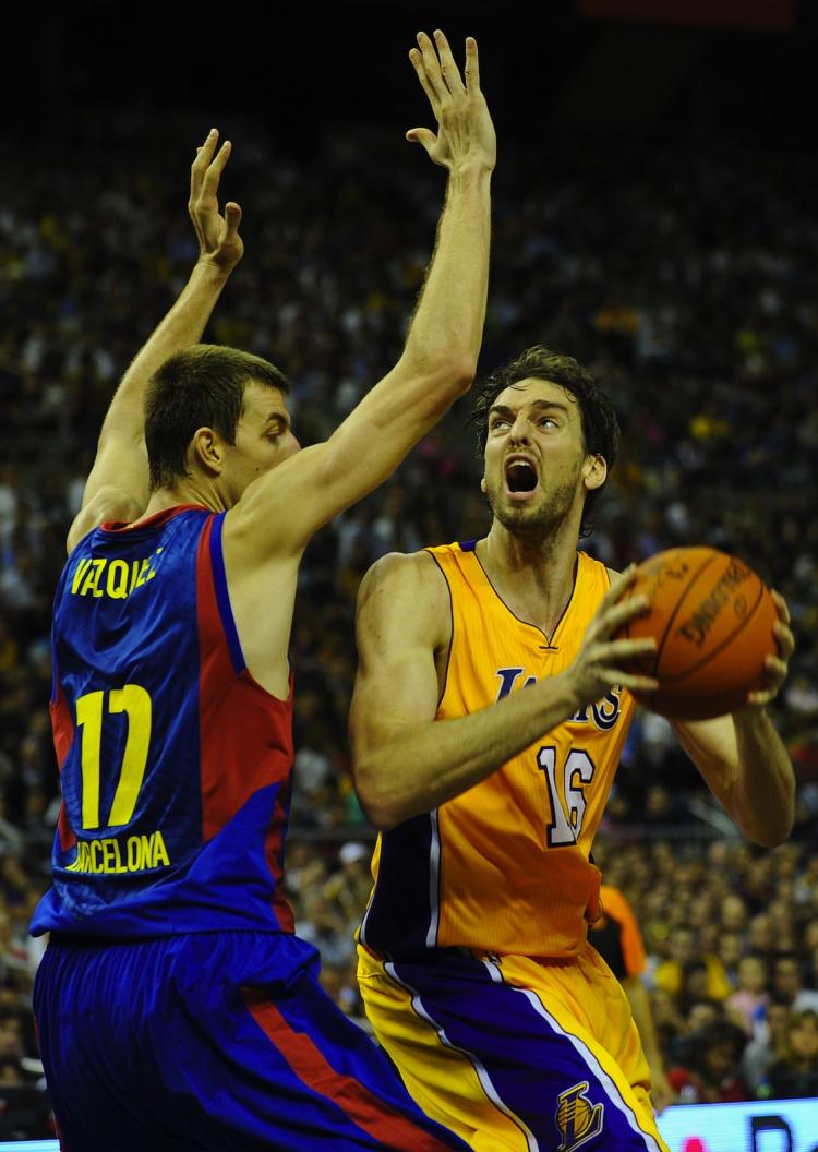 Pau Gasol faced a tough matchup against his native team Barcelona in exhibition play on Thursday. (Lluis Gene/AFP/Getty Images)