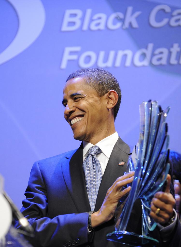 Democratic presidential candidate Illinois Senator Barack Obama receives the Phoenix Award at the Congressional Black Caucus, in Washington, D.C. Sept. 27. (Emmanuel Dunand/AFP/Getty Images)