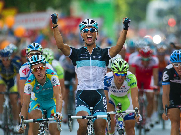 Daniele Bennati of Leopard Trek celebrates as he crosses the finish line of Stage 20 of the Vuelta a España. (Jaime Reina/AFP/Getty Images) Daniele Bennati of Leopard Trek celebrates as he crosses the finish line of Stage 20 of the Vuelta a España. (Jaime Reina/AFP/Getty Images)