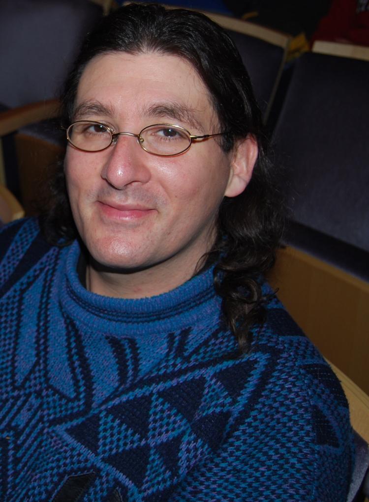 Mr. Bootzin enjoys the Divine Performing Arts show in Madison, Wisconsin. (Lisa Sim/The Epoch Times)