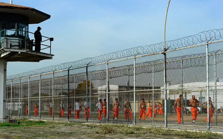 Inmates exercise in the yard at the state prison in Chino, Calif., on Dec. 10, 2010. (Kevork Djansezian/Getty Images)