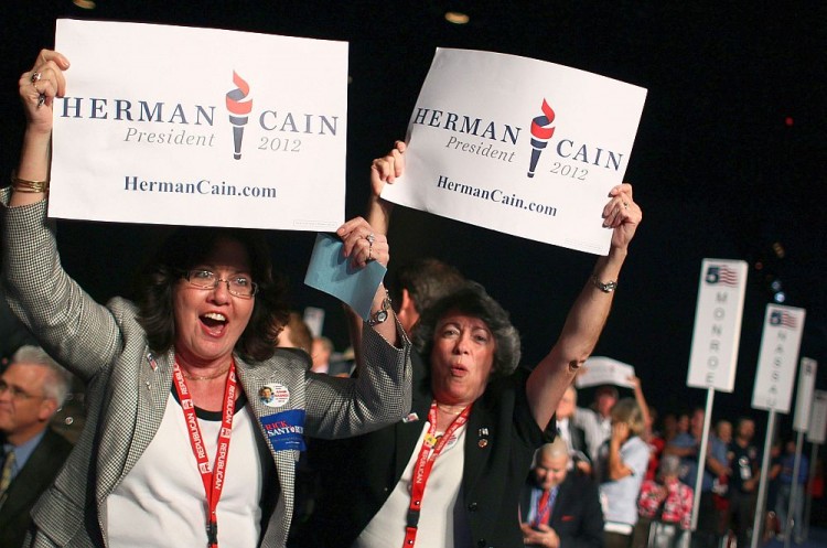 Herman Cain supporters Adelaida Rosario (L), and Mercedes Sabina (R) react to the announcement of Republican presidential candidate Herman Cain winning Florida's straw poll at the Florida Presidency 5 convention at the Orange County Convention Center, Sept. 24, in Orlando, Fla. Herman Cain won Florida's straw poll with 37.11 percent of the vote. (Mark Wilson/Getty Images) Herman Cain supporters Adelaida Rosario (L), and Mercedes Sabina (R) react to the announcement of Republican presidential candidate Herman Cain winning Florida's straw poll at the Florida Presidency 5 convention at the Orange County Convention Center, Sept. 24, in Orlando, Fla. Herman Cain won Florida's straw poll with 37.11 percent of the vote. (Mark Wilson/Getty Images)
