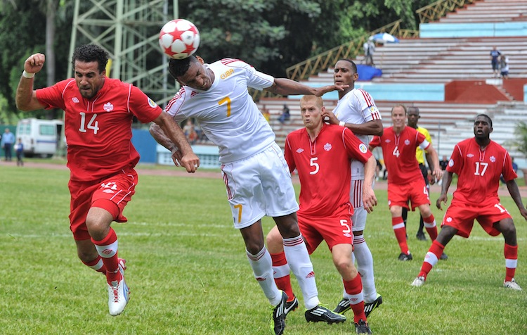 Cuban Marcel Hernandez (C) heads the bal Canada's Dwayne De Rosario (L) and Cuba's Marcel Hernandez compete for the ball in World Cup qualifying play in Havana, Cuba, last Friday. (Adalberto Roque/AFP/GettyImages)