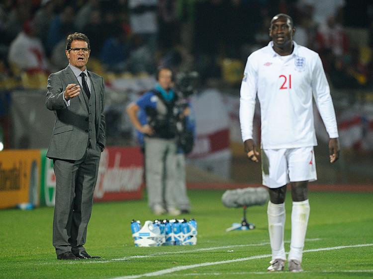 ENGLAND MISFIRING: Manager Fabio Capello barks instructions to striker Emile Heskey. (Kevork Djansezian/Getty Images)