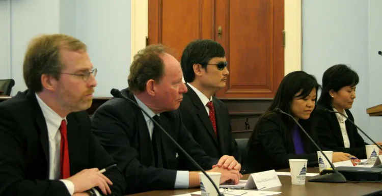 China’s blind human rights activist Chen Guangcheng and Geng He, the wife of human rights lawyer Gao Zhisheng, discuss the challenges of living in a repressive China. (L to R) David Kramer, Freedom House; Edward McMillan-Scott, vice president of the European Parliament; Chen; translator; and Geng He. (Gary Feuerberg/ The Epoch Times)