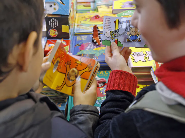 Children reading. (Francois Guillot/Getty Images)