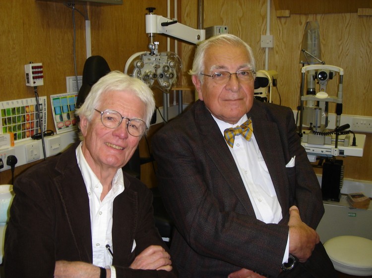 DRS. BUSH AND GIFFORD-JONES: Dr. Sydney Bush (r) has developed a means of reversing arteriosclerosis, which can be confirmed by retinal photographs. (Robert Walker)