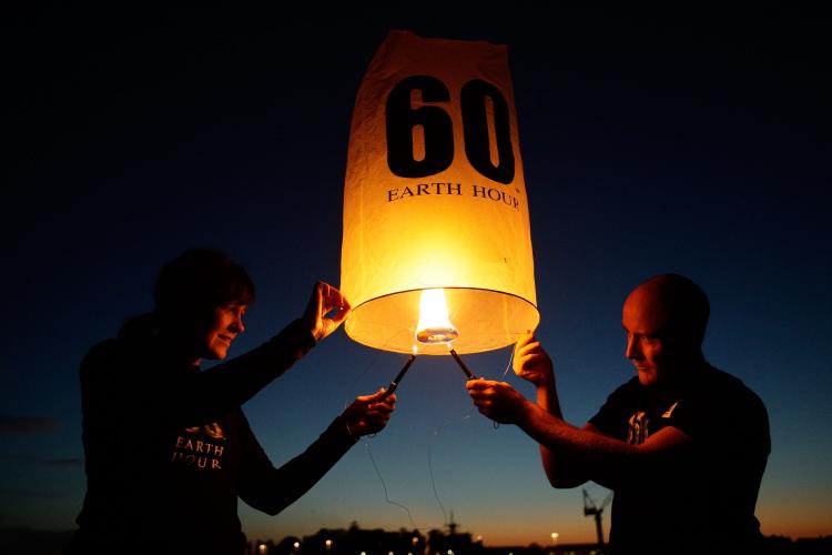 Seven lanterns to represent the seven continents of the world were released over Sydney Harbor on March 20 to launch the one week countdown to Earth Hour. Earth Hour is a global WWF climate change initiative where everyone is invited to switch off their lights for one hour on March 27 at 8.30 p.m. (Brendon Thorne/Getty Images for WWF) Seven lanterns to represent the seven continents of the world were released over Sydney Harbor on March 20 to launch the one week countdown to Earth Hour. Earth Hour is a global WWF climate change initiative where everyone is invited to switch off their lights for one hour on March 27 at 8.30 p.m. (Brendon Thorne/Getty Images for WWF)