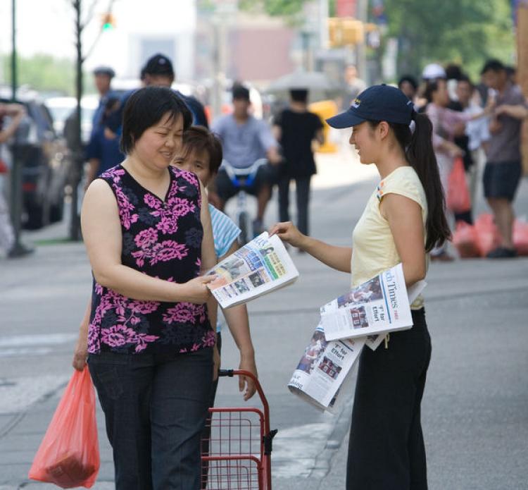 The Epoch Times is distributed by hand in many major cities around the world.  (The Epoch Times)