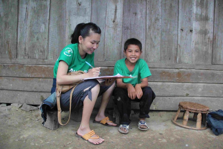 Small Voices 2012, Ga, 12, Laos. Ga doing the survey. Epoch Times Photo