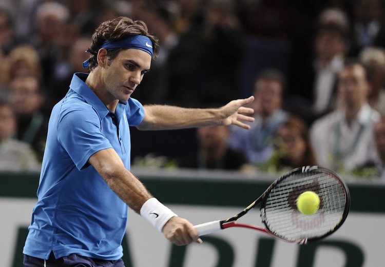 Swiss Roger Federer returns the ball to Swiss Roger Federer returns the ball to