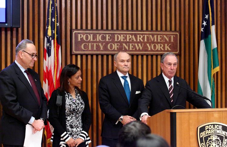 GUN LAW: Sen. Charles Schumer (L), NYPD Commissioner Ray Kelly (2nd from R), and Mayor Michael Bloomberg (R) unveiled new gun laws on Wednesday. Diana Rodriguez (2nd from L) spoke about her 8-year-old daughter who was shot in the Bronx in 2006.   (Gary Du/The epoch Times)