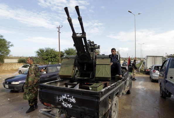 Fighters from the city of Misrata man a checkpoint on the road between Wershefana and Zawiyah cities at checkpoint 27 west of Tripoli. (Joseph Eid/AFP/Getty Images) Fighters from the city of Misrata man a checkpoint on the road between Wershefana and Zawiyah cities at checkpoint 27 west of Tripoli. (Joseph Eid/AFP/Getty Images)