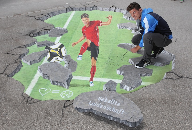 Mario Gomez And PUMA Sign 3D Painting In Munich Mario Gomez And PUMA Sign 3D Painting In Munich