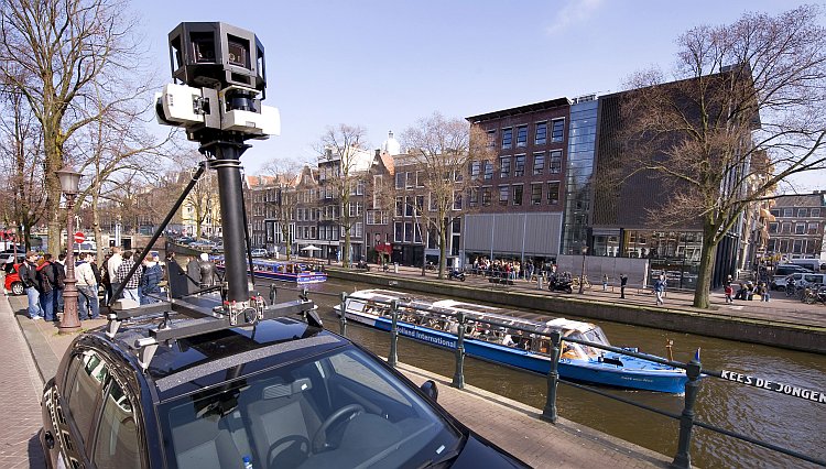 A Google Street View camera fastened on top of a car in Amsterdam A Google Street View camera fastened on top of a car in Amsterdam