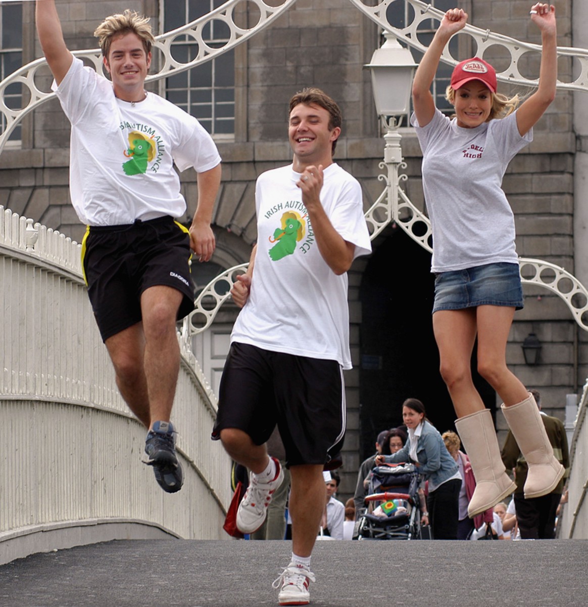 FOR A GOOD CAUSE: (L-R) Simon Casey, Jonathan Wilkes, Hayley Evetts and the rest of the cast from 'Grease' take part in a charity Fun Run from the Ha'Penny Bridge to The Point Theatre on August 10th, 2004 in Dublin, Ireland. Such runs are often organised by volunteer organisations FOR A GOOD CAUSE: (L-R) Simon Casey, Jonathan Wilkes, Hayley Evetts and the rest of the cast from 'Grease' take part in a charity Fun Run from the Ha'Penny Bridge to The Point Theatre on August 10th, 2004 in Dublin, Ireland. Such runs are often organised by volunteer organisations