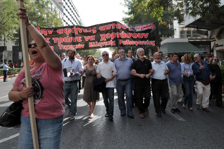 Journalists and radio-TV technicians march in central Athens during their 24-hours strike on October 17, 2012. (Louisa Gouliamaki/AFP/Getty Images) Journalists and radio-TV technicians march in central Athens during their 24-hours strike on October 17, 2012. (Louisa Gouliamaki/AFP/Getty Images)