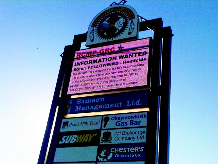 A billboard in Hobbema asks for information on the July 11 shooting death of 5-year-old Ethan Yellowbird. Samson Cree band leaders on the reserve are proposing a bylaw that could evict gang members and criminals from the troubled community. (Justina Reichel/The Epoch Times) A billboard in Hobbema asks for information on the July 11 shooting death of 5-year-old Ethan Yellowbird. Samson Cree band leaders on the reserve are proposing a bylaw that could evict gang members and criminals from the troubled community. (Justina Reichel/The Epoch Times)