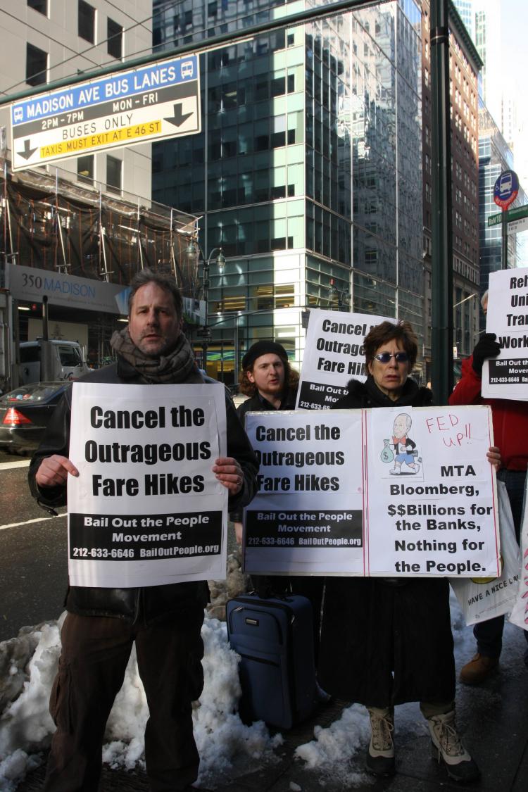 FARE HIKE RAGE: Protesters gathered in front of the MTA office on Madison Avenue Thursday to decry the fare hikes that took effect that morning. (Tara MacIsaac/The Epoch Times) FARE HIKE RAGE: Protesters gathered in front of the MTA office on Madison Avenue Thursday to decry the fare hikes that took effect that morning. (Tara MacIsaac/The Epoch Times)